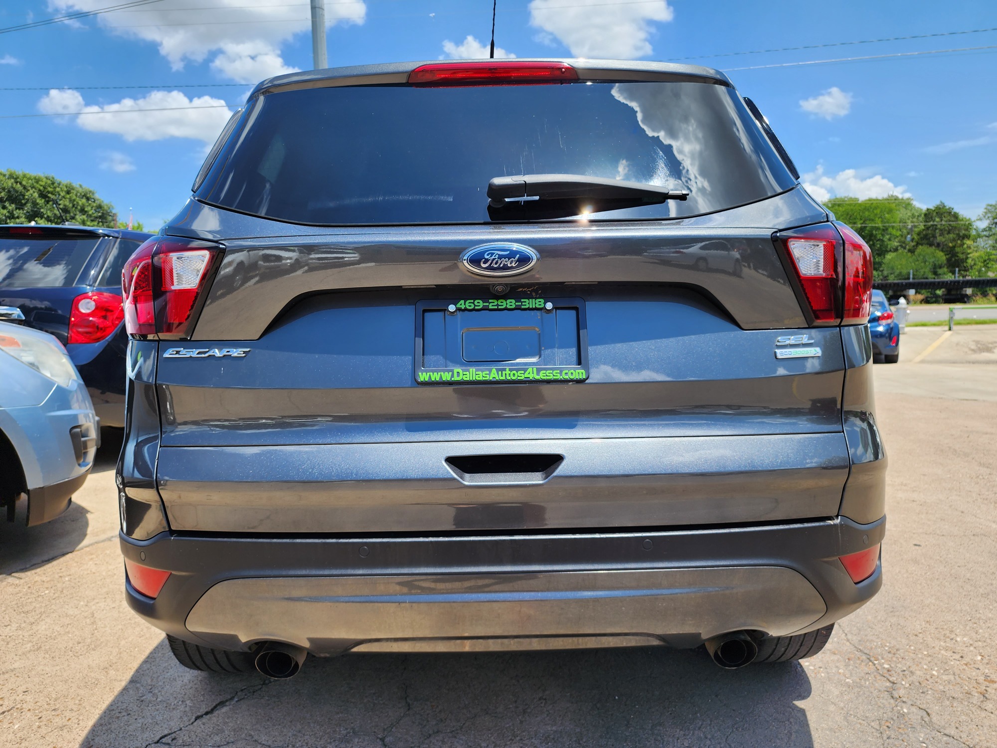 2019 GRAY Ford Escape SEL (1FMCU0HD2KU) , AUTO transmission, located at 2660 S.Garland Avenue, Garland, TX, 75041, (469) 298-3118, 32.885551, -96.655602 - Welcome to DallasAutos4Less, one of the Premier BUY HERE PAY HERE Dealers in the North Dallas Area. We specialize in financing to people with NO CREDIT or BAD CREDIT. We need proof of income, proof of residence, and a ID. Come buy your new car from us today!! This is a Super Clean 2019 FORD ESCAP - Photo #4